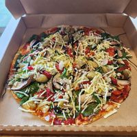 Vegan pizza with vegan cheese at UMU in Coromandel