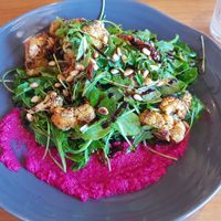 Roasted cauliflower with greens and beetroot pesto. at The Wintersun in Geraldton