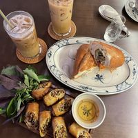 Rolls, Bahn Mi, Oat latte  at Vi Que Kitchen Restaurant in Ho Chi Minh City