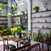 Cafe Area with Library at Vi Que Kitchen in Ho Chi Minh City