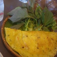 Bánh xéo 8/10 a unique exp for myself this was cool and tasty and a big serving size which was welcome maybe too much leaf for the pancake also the pancake filling wasn't elite at Vi Que Kitchen in Ho Chi Minh City