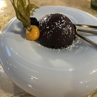 Amazing raspberry mousse covered in dark chocolate.  We were already stuffed, but ordered this anyway and were so glad we did.  at Vrindaa in Rome