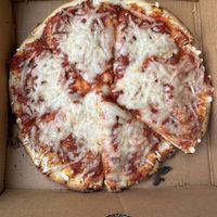 Vegan cheese pizza   at Tiger Lily Cafe in Chesterton