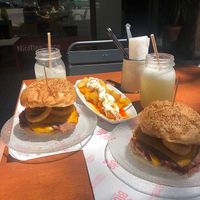 Onion ring burger and bravas  at La Golosa Vegan Vurger in Barcelona