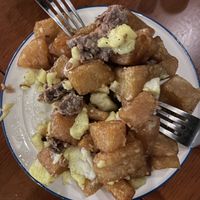 Bravas with vegan egg  at La Golosa Vegan Vurger in Barcelona