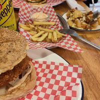 Not Chicken burger and vecon burger in the distance at La Golosa Vegan Vurger in Barcelona