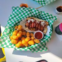Bak and wrap dog with tater tots at Veg & Go Plant Based in Riverside