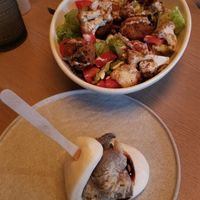 Bao Slider (chick 'n fried mushrooms, hoisin, pickled cucumber), Habibi Bowl (roasted cauliflower, falafel, tahini , sunflower vinagrette) at PLANTA in West Palm Beach