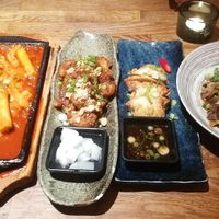 tteok bokki, cauliflower wings, kimchi mandu, champions at Kini in Hamburg