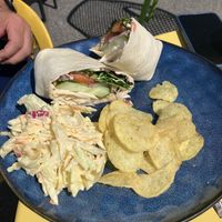 Chicken salad wrap with coleslaw and chips   at Scoff's in Horsforth
