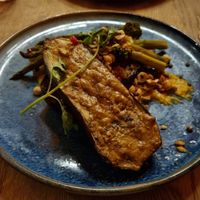 The green, bean, aubergine main dish: grilled aubergine with peanut coconut sauce, green asparagus, white bean puree and some great toppings; it was fantastic at BomBaai Strandbar in Westkapelle