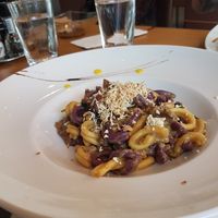 Pasta with chantarelle sauce and grated tofu. at Sputnik in Ljubljana