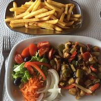 Vegan plate made after asking and french fries at Restaurante Rumar in Faial
