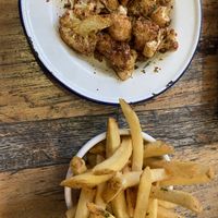 Harissa cauliflower and greek fries w/o cheese   at Aplos Simple Mediterranean in Jackson