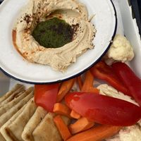 Hummus plate with half pita half veggies   at Aplos Simple Mediterranean in Jackson