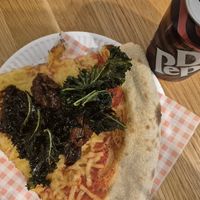 Kale and sweet onions and dried tomatoes  really delicious at Civerinos Slice - Prom Slice in Edinburgh