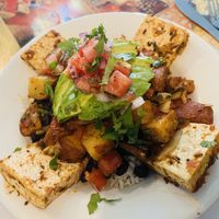 Tofu bowl w/ black beans, rice, pico, potatoes, and avocado.   at Surrey's Cafe and Juice Bar in New Orleans