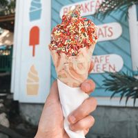 Soft serve swirl in birthday cake waffle cone and rainbow sprinkles   at Irie Pops in St John