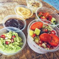 Avocado bread spread, fruit jam, peanut butter, hummus, vegan greek joghurt with fruit and a side salad at Goldjunge Aachen-Laurensberg in Aachen