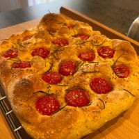 Focaccia with tomatoes and rosemary at The Rolling Pin Cooking School in Padua
