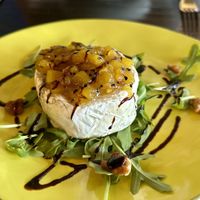 Brie w mango chutney, praline walnuts, arugula  at Ka Papa Cuisine in Sarasota