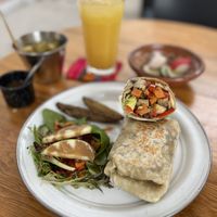 Vegan Wrap, O. J. , and sides    at Calmate Cafe in Puerto Vallarta
