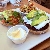 Vegan burger with chickpea side   at The Cafe in Naples