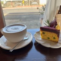 Black Sesame Latte and Pumpkin Cake slice with Purple Sweet Potato frosting (V, GF).  at Pengohoda - 펜고호다 in Jeju