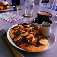 Pancakes and breakfast muffin  at Slice + Dice in Norwich