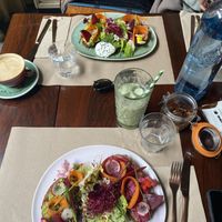 avocado & beetroot hummus toast + oat matcha latte  at Faire Brunch & Drinks in Barcelona