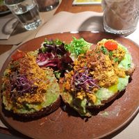 Avocado toast with scrambled eggs at Faire Brunch & Drinks in Barcelona