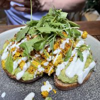 Avocado toast, with tofu scramble  at Faire Brunch & Drinks in Barcelona