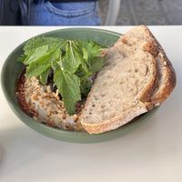 Eggplant hummus dip with sourdough - good  at Faire Brunch & Drinks in Barcelona