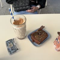 Banana bread and iced chai oat latte   at Faire Brunch & Drinks in Barcelona