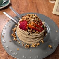 Pancakes with strawberries and granola at Maria Rosa in Ponte De Lima