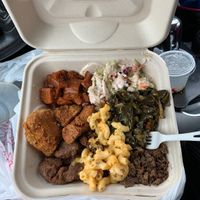 Candy yams, slaw, collard greens, Tri-tip, chopped Links, and fried chicken( all Vegan) Amazing!!!!!! at Vegan Mob in Oakland