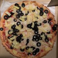 Vegan pizza with GF crust! pineapple & black olives  at Pizzeria Bacio Ristorante in Poughkeepsie
