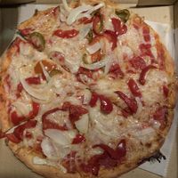 Vegan pizza with GF crust! cherry peppers & onion  at Pizzeria Bacio Ristorante in Poughkeepsie