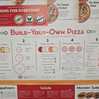 Menu clearly marks all vegan options at Monster Pizza in Deltona