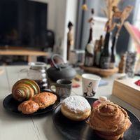 Pistachio croissant, cougnou, boule de berlin, cruffin  at La Pâtisserie Vegan - Les Saveurs De La Bastille in Liege