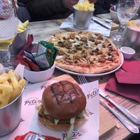 Peri chicken burger with meatfeast pizza at The Woolpack in Wilstead