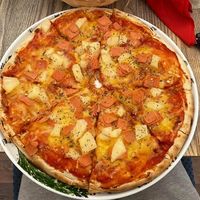 “Ham” & pineapple pizza  at The Woolpack in Wilstead