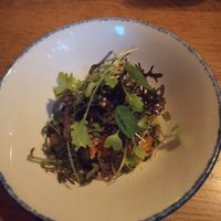 Too dark to take many photos. This dish was a pumpkin salad. Very unique and flavoursome. at Bistro Lupa in Copenhagen