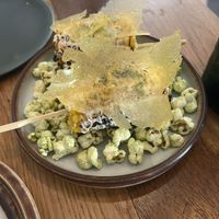 Danish corn cob over pickle seasoned popcorn  at Bistro Lupa in Copenhagen