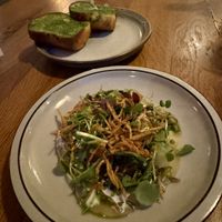(Soy) milk bread with ramsons pesto and a delicate finely sliced Al dente potato salad   at Bistro Lupa in Copenhagen