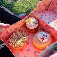 Carrot cupcake with sweet cinnamon topping, nougat doughnut (left) sprinkled with lots of hazelnuts and a tiramisu doughnut (right) with a delicious coffee icing and fluffy cream! at Kjeks - Schanze in Hamburg