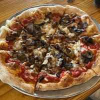 SOOO GOOD! must get the sautéd mushrooms 🍄   at Pinthouse Pizza in Austin