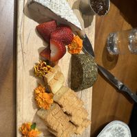 Cheese board with fruit and fig jam  at DC Vegan in Washington