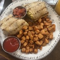 Breakfast burrito with home fries   at DC Vegan in Washington