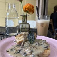 Biscuits and gravy, chai latte  at Acorn Community Cafe in Eugene